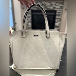 Kate Spade silver/grey leather x-large tote. Top zip closure.